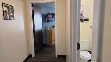 Shower, hair dryer, towels, shampoo