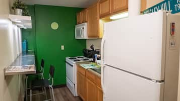 Microwave, oven, coffee/tea maker, cookware/dishes/utensils