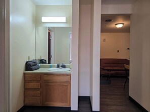 Shower, hair dryer, towels, shampoo