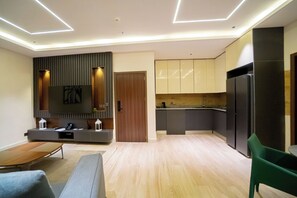 Apartment | Living area | 50-inch LED TV with satellite channels