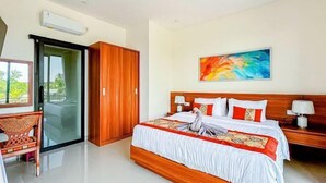 A modern hotel room with a large bed, wooden wardrobe, and a glass door leading to a balcony. - Dajan Dukuh Villa (2 Bedroom Villa with Minimum Stay 2 Night) (Bali)