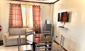 Living area - Cranberry's 2Br Unit nr Convention Center #1 (Iloilo City)