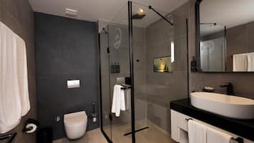 Deluxe Room, Balcony, City View | Bathroom | Shower, hair dryer, towels, soap