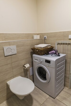 Hair dryer, towels, soap, toilet paper