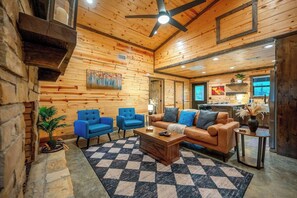 Signature Cabin, 2 Bedrooms, Private Pool | Living room | 50-inch Smart TV with digital channels, fireplace - The Pickleball Pines (Broken Bow)