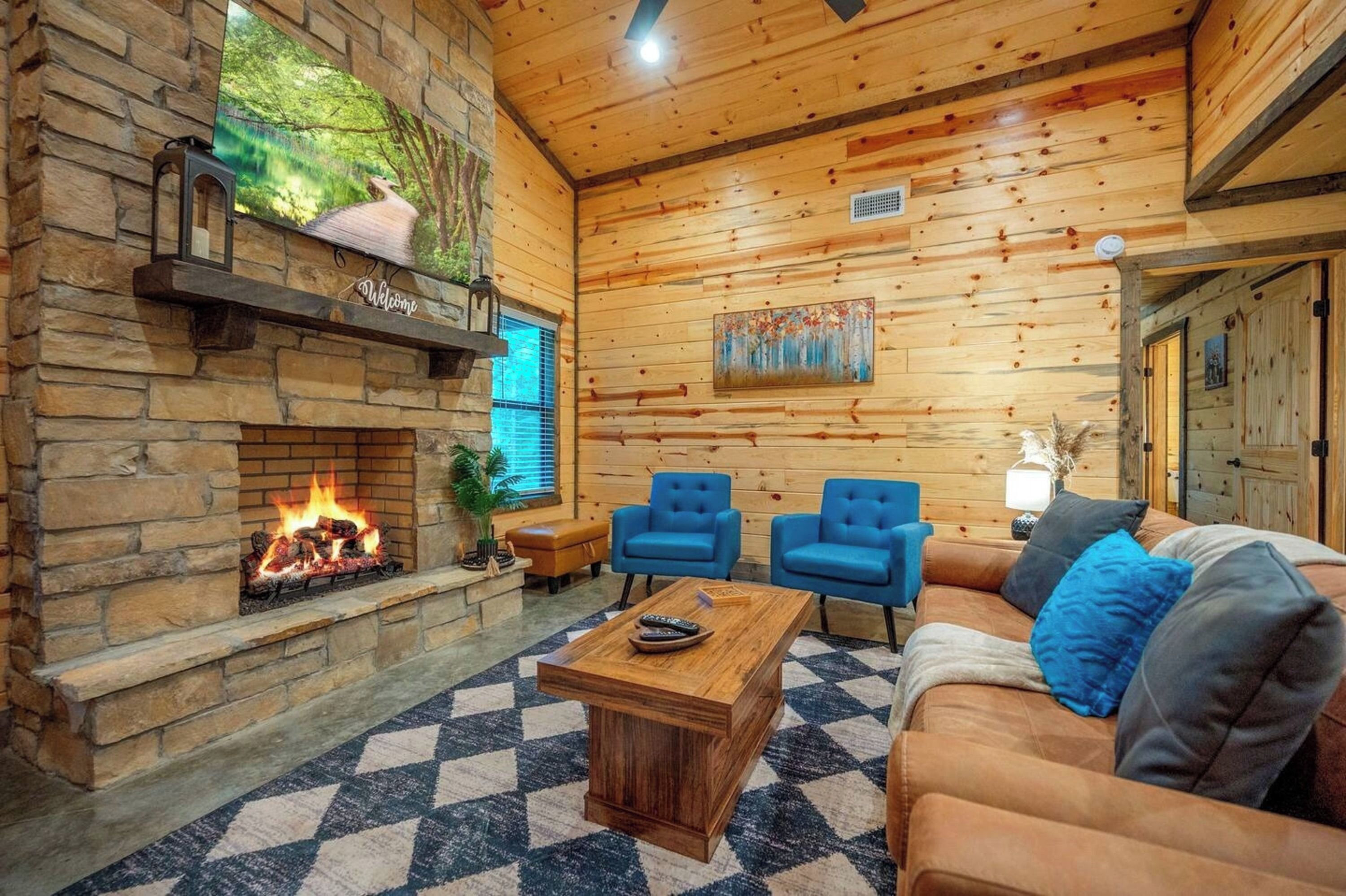 Signature Cabin, 2 Bedrooms, Private Pool | Living room | 50-inch Smart TV with digital channels, fireplace