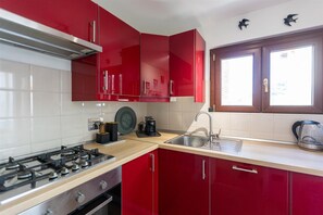 Apartment | Private kitchen | Microwave, dishwasher, espresso maker, coffee/tea maker - Rental in Rome San Pancrazio Penthouse (Rome)