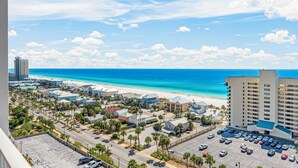 A coastal hotel with a view of the beach and ocean. - Beachfront condo w/ daily attraction tickets (Panama City Beach)