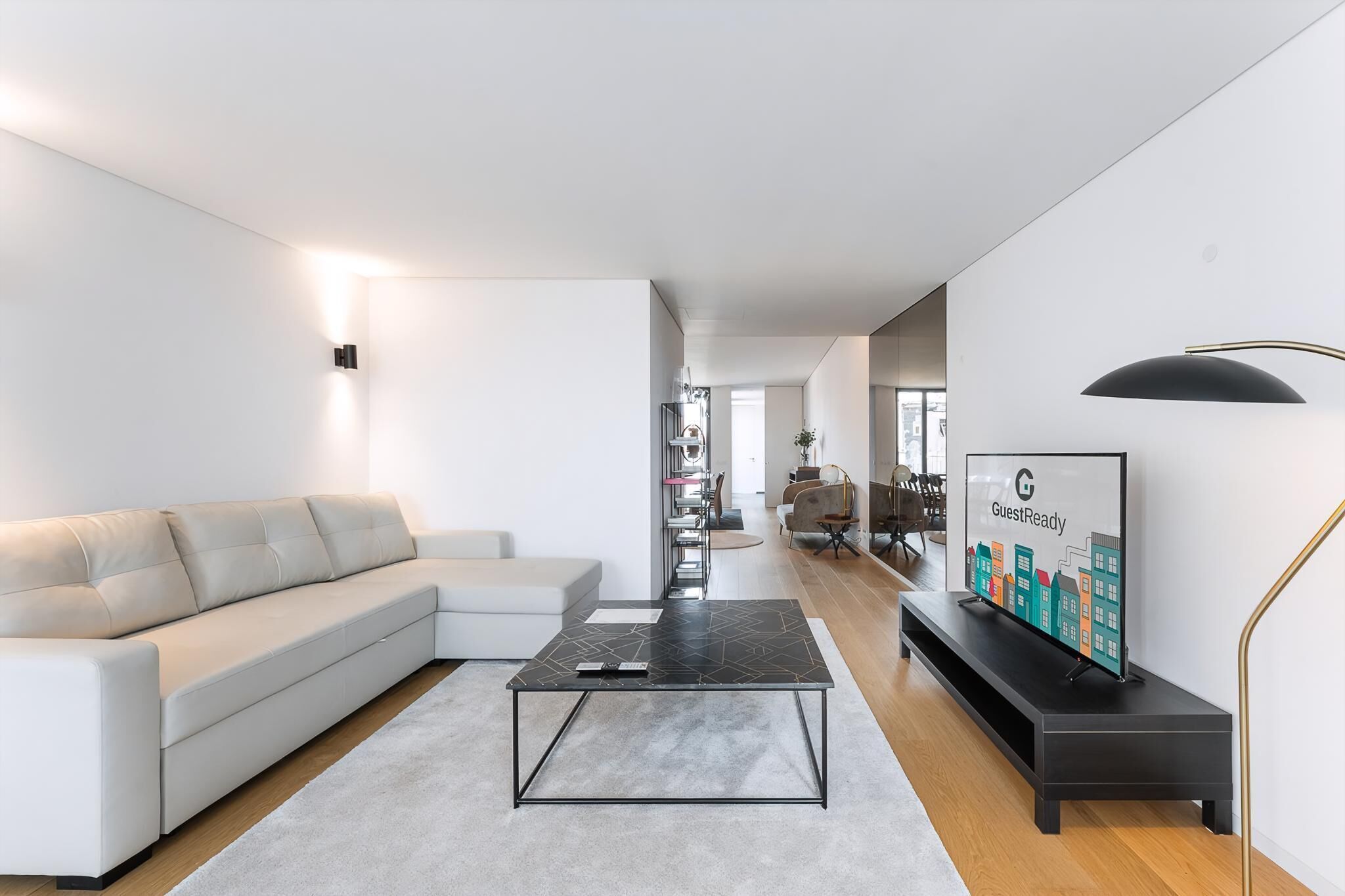 Apartment (Three-Bedroom Apartment with Balcony) | Living area | 32-inch flat-screen TV with digital channels