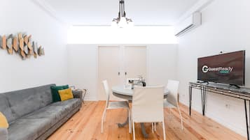 Apartment (Two-Bedroom Apartment) | Living area | 32-inch flat-screen TV with digital channels