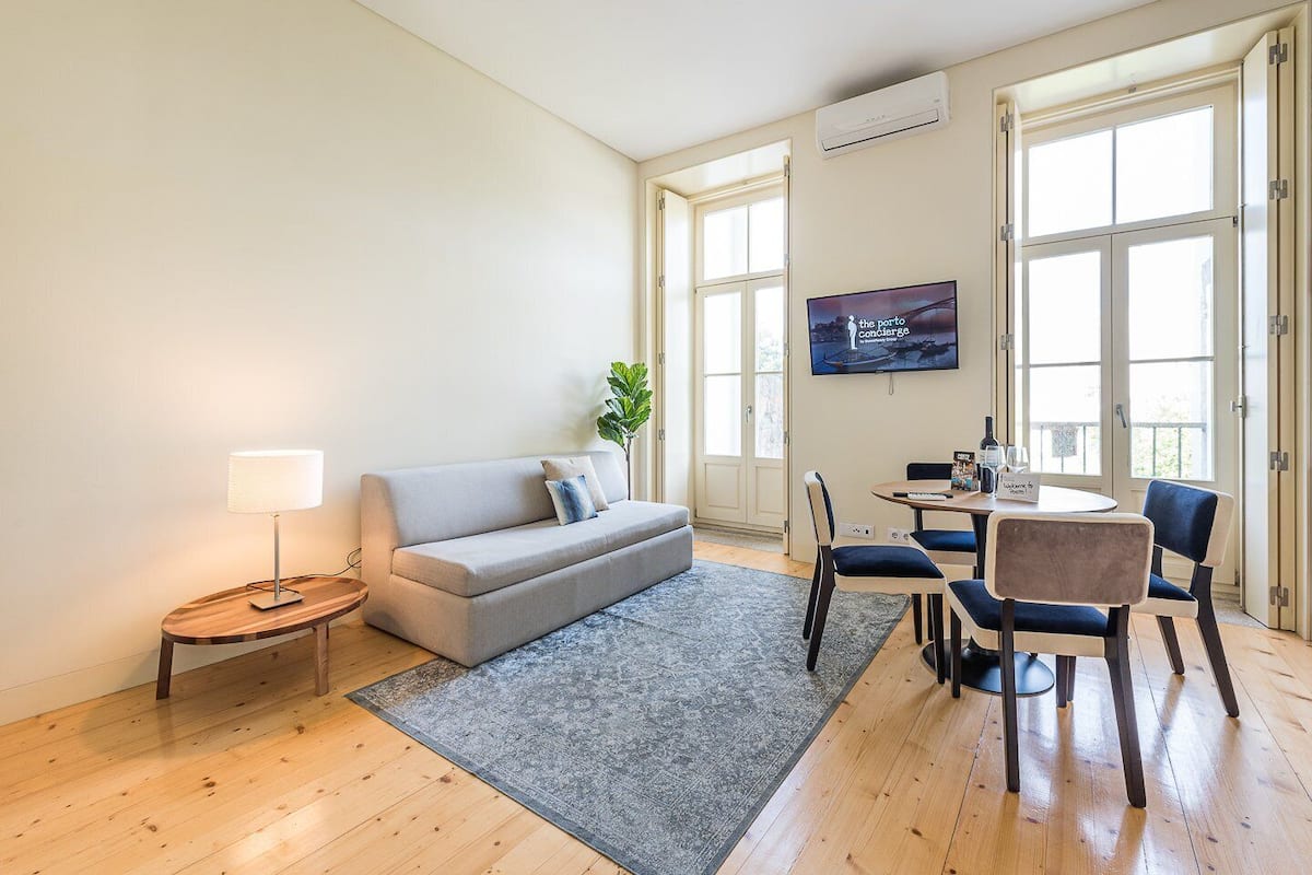 Apartment (One-Bedroom Apartment with Balcony) | Living room | 32-inch flat-screen TV with digital channels
