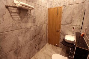 Shower, towels, soap, shampoo