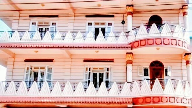 A multi-story building with balconies and windows. - Ojas Home Bharatpur (Bharatpur)