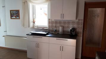 Fridge, microwave, stovetop, coffee/tea maker