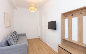 Apartamento | Zona de estar | Una televisión de pantalla plana