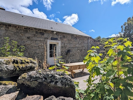 Outdoor dining. Cottage “L'École Buissonnière de Mazalibrand”: Mountain View, Private Terrace & Garden