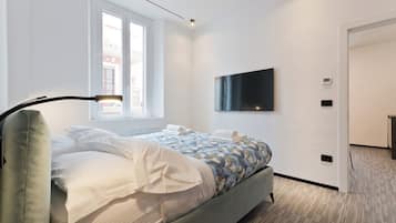 1 slaapkamer, een strijkplank/strijkijzer, internet, beddengoed