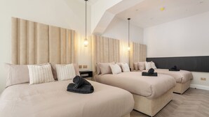 A hotel room with two beds, a large window, and a modern design. - Bold St ApartHotel | Book Individually or Book 8! (Liverpool)