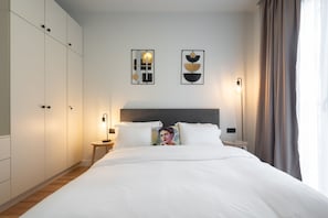 2 chambres, chambres insonorisées, fer et planche à repasser