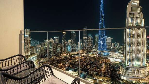 A balcony with a cityscape view, including the Burj Khalifa and Emaar buildings. - Fabulous Burj Khalifa Views - 5min walk to Dubai Mall (Dubai)