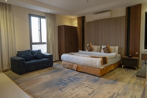 Junior Suite, City View | In-room safe, blackout drapes, soundproofing, iron/ironing board
