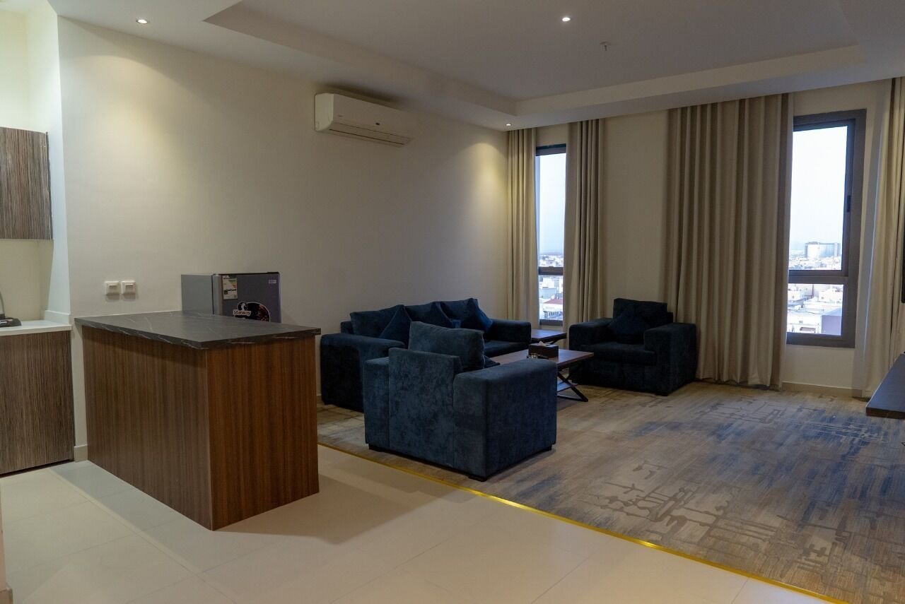 Suite familiar, vistes a la ciutat | Sala d'estar