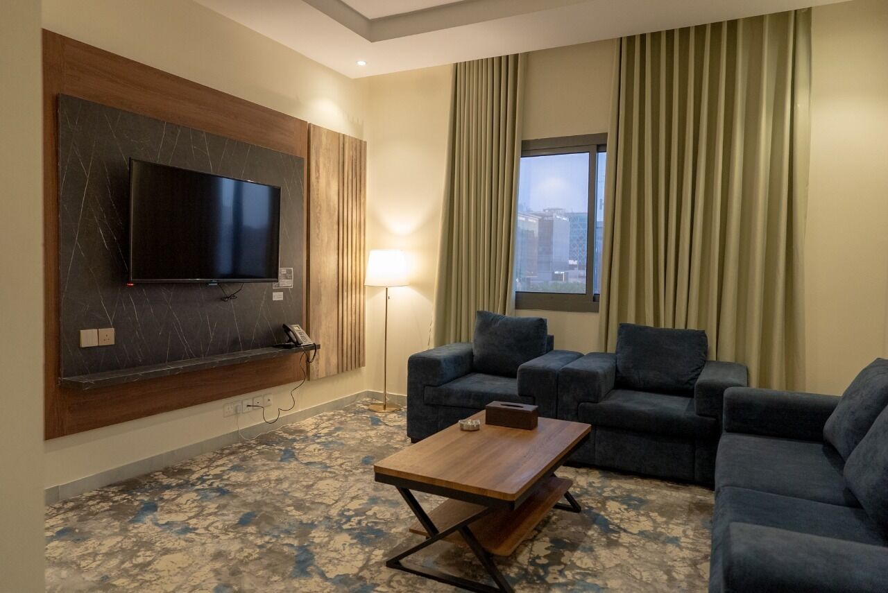 Suite junior, vistas a la ciudad | Zona de estar