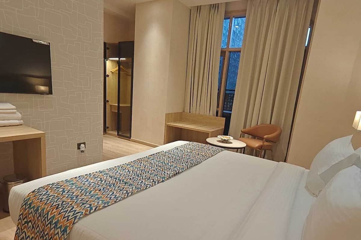 Chambre Standard Double ou avec lits jumeaux | Bureau, fer et planche à repasser, Wi-Fi gratuit