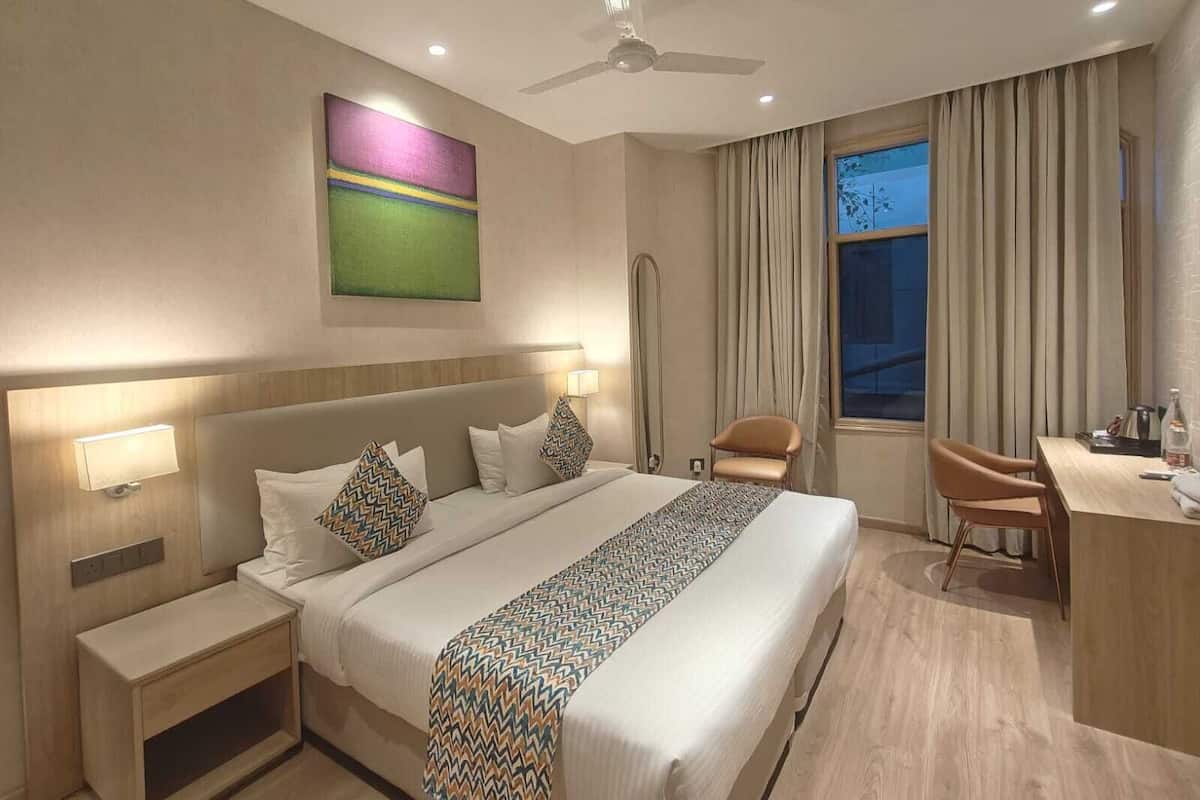 Chambre Exécutive Double ou avec lits jumeaux | Bureau, fer et planche à repasser, Wi-Fi gratuit