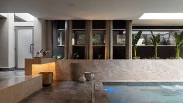 Indoor pool, sun loungers