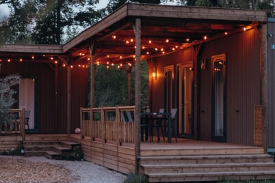 Three cosy lodges for 12 guests with nature views, own kitchen and modern rain shower bathroom.