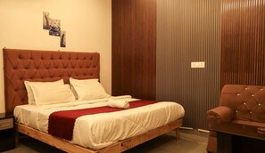 Premium bedding, rollaway beds, free WiFi, bed sheets - Amara Inn (Greater Noida)