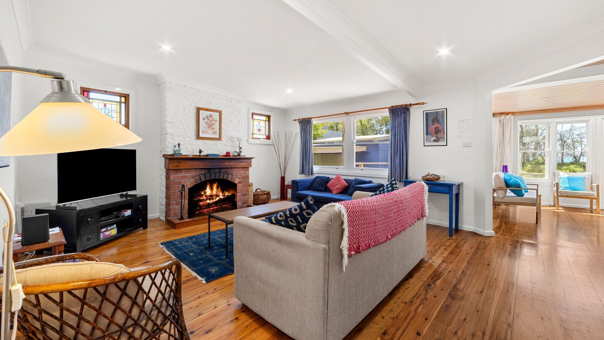 Smart TV, fireplace, books, stereo