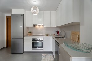 Fridge, microwave, oven, stovetop - Holiday Apartment 'La Tejita Beach' with Private Pool, Private Terrace and Wi-Fi (Granadilla)