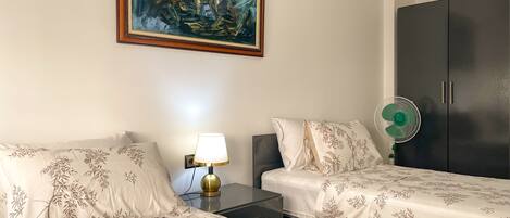 2 habitaciones, tabla de planchar con plancha y wifi gratis