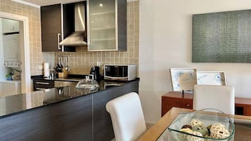 Departamento, 2 habitaciones, frente al océano | Cocina privada