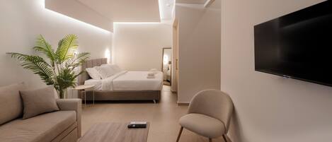 Suíte estúdio luxo, 1 cama Queen e sofá-cama, para não fumantes, cozinha | Quartos à prova de som, ferros/tábuas de passar roupa, Wi-Fi de cortesia