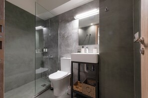 Suite estudio Deluxe, 1 cama Queen size y sofá cama, para no fumadores, cocina | Baño | Pantuflas 