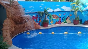 Outdoor pool, open 9:00 AM to 10:00 PM, pool umbrellas
