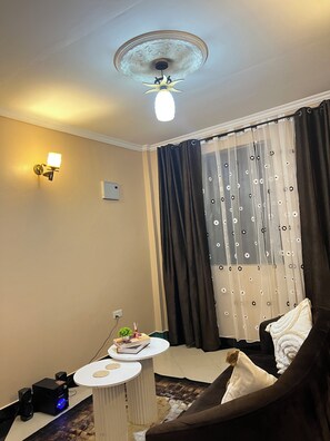 Living area - KARIBU RETREAT 01 ~ Near Town ,Cultural Heritage Centre ,Cafes &supermarkets (Arusha)