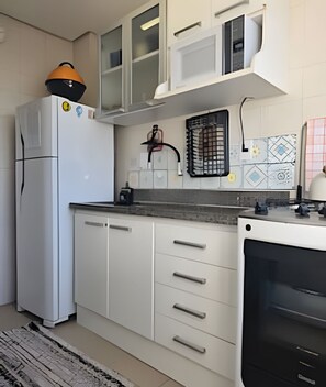 Standard Apartment | Private kitchen - Estadia Tri Ótima Localização e Garagem (Porto Alegre)
