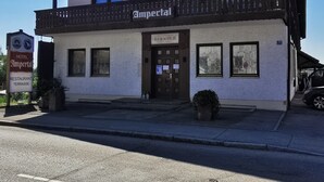 A two-story building with a sign reading "Imperial Hotel Restaurant Terrace." - Hotel Restaurant Ampertal (Haag an der Amper)