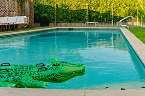 Outdoor pool - Poolside Funhouse - Arcade, Billiard, Poker & More (Austin)