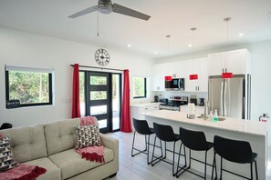 Standard Apartment | Living area | 43-inch Smart TV with digital channels, Netflix, streaming services