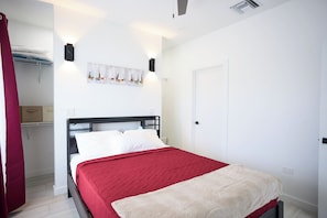 Standard Apartment | In-room safe, desk, laptop workspace, blackout curtains