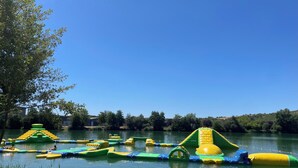 A water park with inflatable structures. - Unusual: The Knights' Lodge—Medieval-themed, air-conditioned, and featuring balneotherapy (Sens)