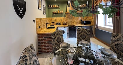 Medieval-themed accommodation; restored mansion with whirlpool bath