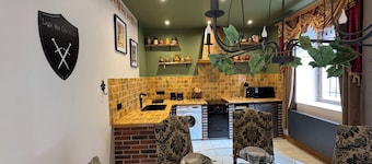 Medieval-themed accommodation; restored mansion with whirlpool bath