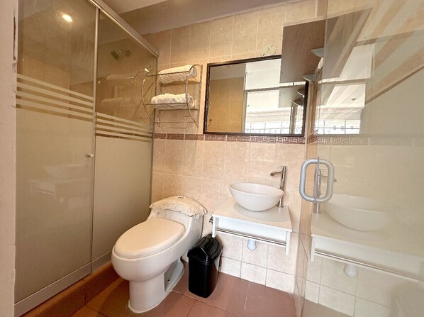 Shower, towels, soap, toilet paper