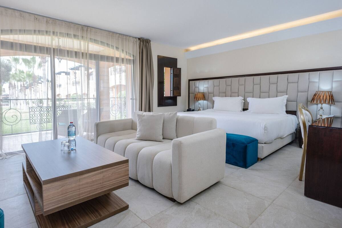 Deluxe Suite, Balcony, Resort View | In-room safe, desk, laptop workspace, free WiFi